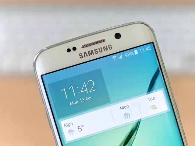 In the foreground of the image there is a phone.