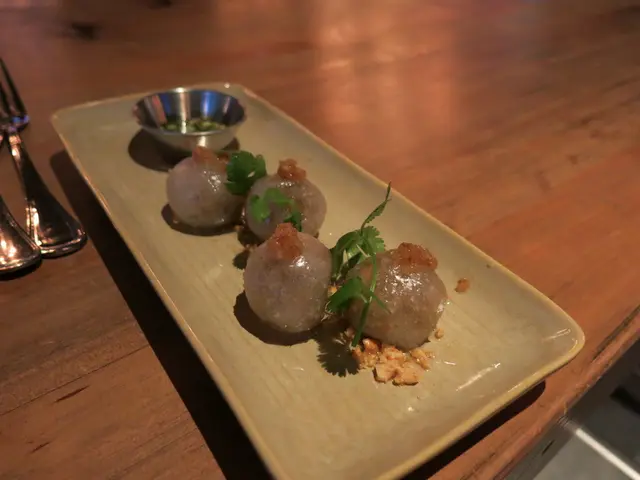 These are the food items in a plate. On the left side there is a fork.