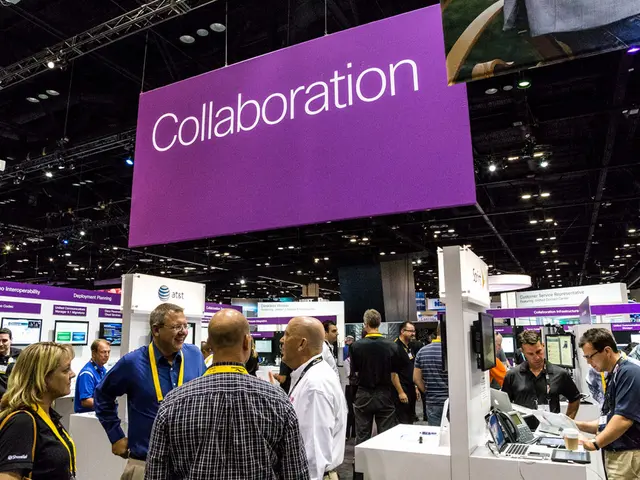 This picture shows few people standing and they were ID cards and we see a television and a...