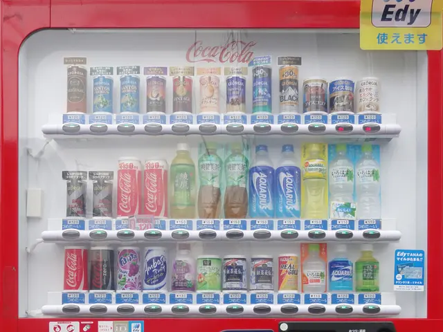 This is a picture of a Vending machine where there are bottles and tins inside it, labels stick to...