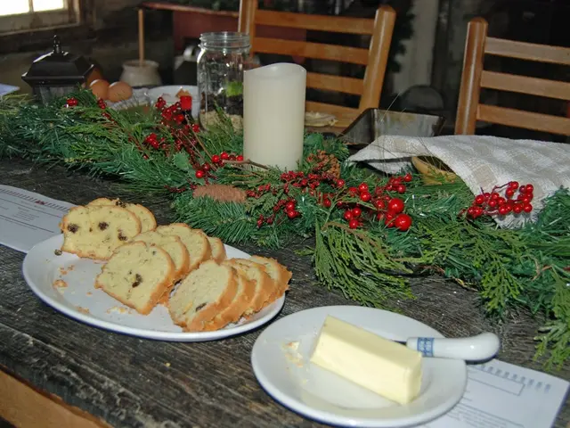 This is a picture taken in a room, this is a table on the table there are plates, food items,...
