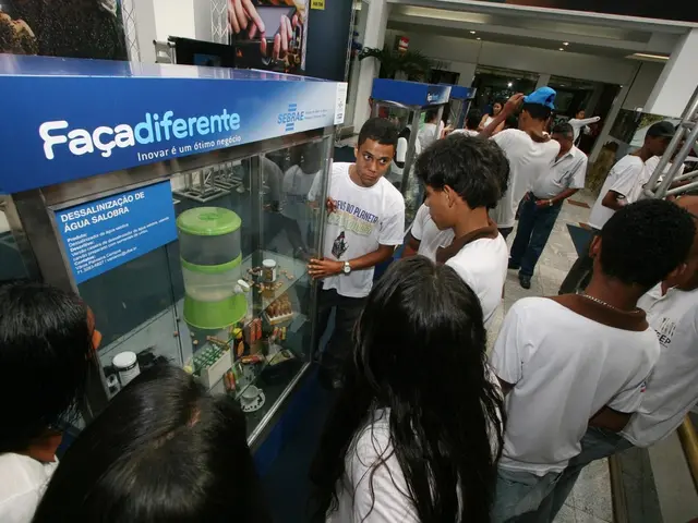 In this image there are a few people standing and checking out a machine.